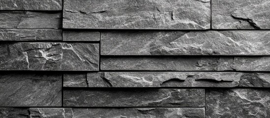 Poster - textured black slate stone background for design with ample copyspace and elegant panorama layout id