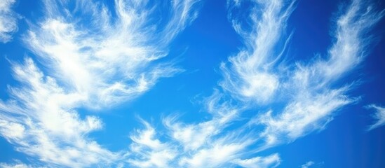 Aufkleber - Serene bright blue sky with wispy white clouds creating a tranquil backdrop with ample empty space for text and design elements