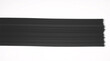 © AC - Flat Black Tape Strip on White Background – Minimalist Composition