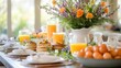 © Diffin - A festive Easter table filled with colorful food, treats, and refreshing orange juice for a joyful celebration.