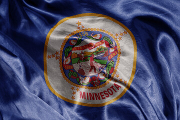 Wall Mural - big shine waving colourful realistic flag of minnesota state . macro shot