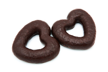 Holiday cookies in chocolate glaze isolated on white background. Cookies in the shape of heart.	