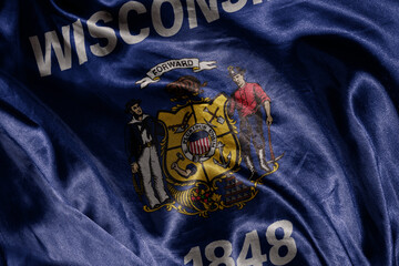 Wall Mural - big shine waving colourful realistic flag of wisconsin state . macro shot