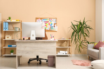 Poster - Interior of designer's office with workplace and shelf units