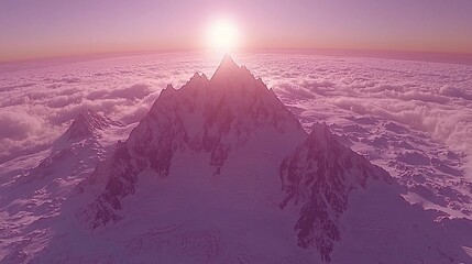 Canvas Print - Majestic snow-capped mountain peak at sunset above clouds.