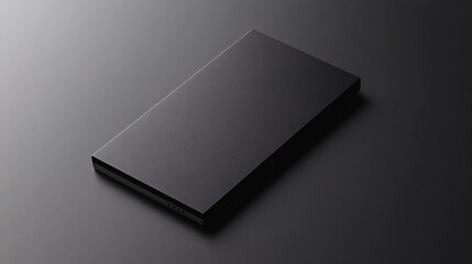 Aufkleber - Black slab resting on dark surface representing minimalism and modern design