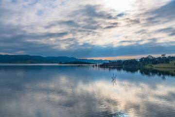 Naklejka na meble Morning cloud reflections at Windamere Dam in Cudgegong, close to Mudgee in the Central West of NSW, Australia.