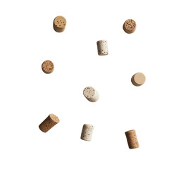 Poster - Multiple wine corks of varying shapes and shades of brown and beige are shown falling against a transparent backdrop.