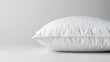 © STwul - Fluffy white pillow, studio shot, simple background, bedding product