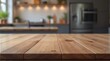 © Studio VIP - Smooth wooden tabletop showcasing fine grain detail, illuminated by soft light, with a blurred modern kitchen adding balance to the composition.