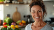 © Keopaserth - close up portrait of fit and healthy woman smiling in kitchen filled with fresh vegetables and fruits, showcasing vibrant lifestyle