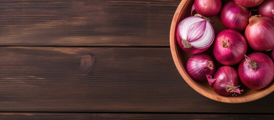 Poster - Basket of whole and cut red onions atop a rustic wooden background with deep brown hues creating ample copy space on the left side of the image