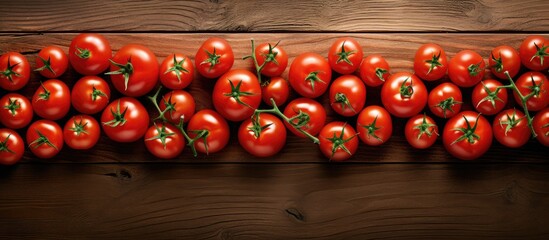 Poster - Fresh ripe tomatoes displayed in a neat row on a rustic wooden table with a warm brown tone and ample copy space for text customization.