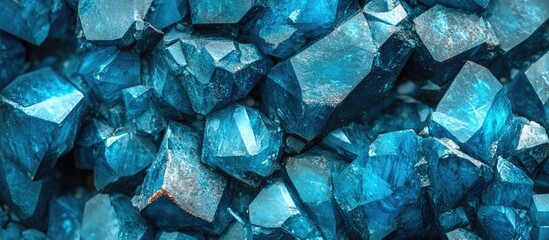 Leinwandbilder - Vibrant blue crystalline texture showcasing sharp, angular shapes of copper sulfate against a dark background, highlighting its unique mineral composition.
