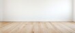 © Gular - Minimalist interior with empty white wall on the left and light wooden oak floor in foreground, creating a spacious and airy atmosphere.
