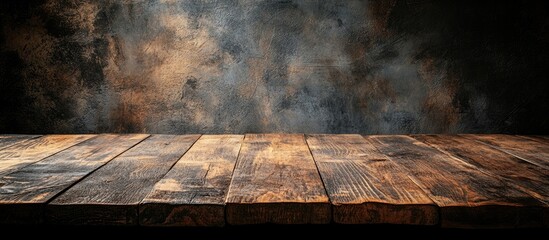 Poster - Cozy wooden table in foreground with dark textured wall background warm earthy tones create inviting atmosphere for home decor and design