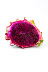 Wall Mural - Close-up of a cut dragon fruit, showcasing its vibrant red flesh and black seeds, isolated on a white background. The combination of rich colors and texture emphasizes its fresh and tropical appeal.