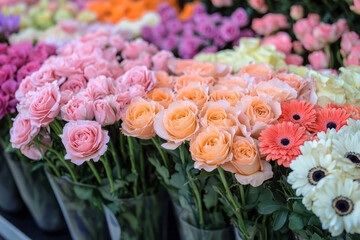 Poster - A flower market with stalls filled with fresh flowers in all shapes and colors,