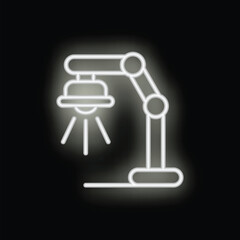 Poster - Neon desk lamp shining bright light on black background, perfect for minimalist designs