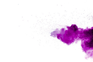 Wall Mural - Purple particles explosion on white background.Freeze motion of purple dust splash on background.