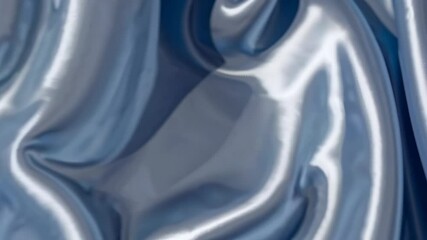Poster - Silky blue fabric with smooth waves and glossy sheen, intricate texture. Textile and fashion concept