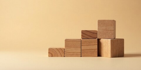 Poster - Ascending Wooden Blocks A Minimalist Composition of Natural Wood Cubes Arranged in a Step-like Formation Against a Smooth, Neutral Background