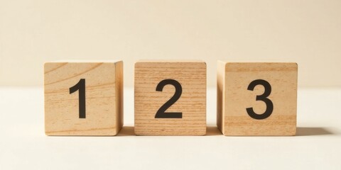 Aufkleber - Wooden blocks displaying sequential numbers one, two, and three on a light background