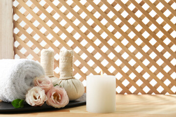 Wall Mural - Composition with cosmetic products for spa treatment on wooden table, space for text