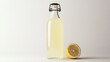 © Amanda - Refreshing lemonade in a glass bottle, next to a lemon slice. Perfect for summer!