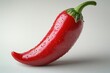 © Ева Поликарпова - A close-up shot of a bright red hot pepper with water droplets on its surface
