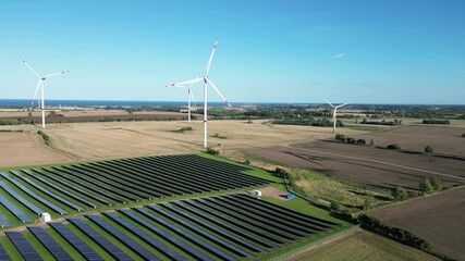 wind and solar park turbine renewable energy power aerial view photo at the baltic sea near heiligen