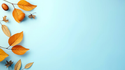 Wall Mural - Blue background with leaves and an orange fruit. Minimalistic blue background.