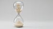 © schiers_images - An hourglass filled with sand and a dollar sign emphasizes the connection between time and financial considerations, suitable for illustrating financial concepts and temporal management.