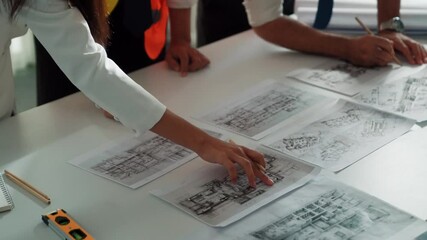 Poster - close up of skilled business man and smart colleague design house together. aerial view of architect