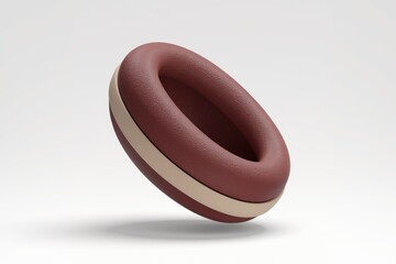 Poster - A maroon torus with a beige band, levitating against a white backdrop.