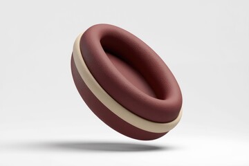 Aufkleber - A maroon and beige ring-shaped object, possibly a unique home decor piece or product component.