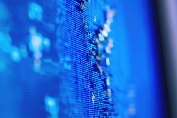 Poster - Close-up shot of a computer screen with a blue background, great for technology and innovation concepts