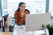 © Home-stock - Women in business. Concentrated European lady manager sitting in front of computer monitor, working in modern office interior