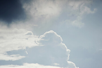Wall Mural - close up of moody clouds turn grey before rain
