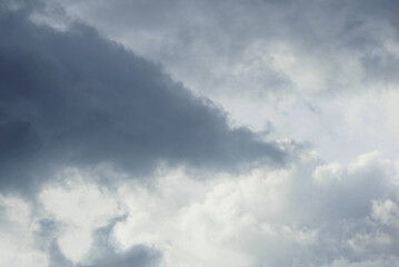 Wall Mural - close up of moody clouds turn grey before rain