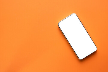 Smartphone with empty white display on orange background suitable for tech mockups, mobile app promotions, and creative technology themes.