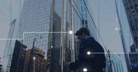 Poster - Businessman using smartphone, data network image over city skyscrapers