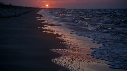 gentle waves gently breaking against the soft sand on a beach during sunset, with warm sunlight refl