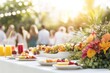 © Viktoriia - Vibrant outdoor gathering with colorful fruit display and refres