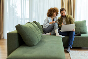 Engaging conversation sparks creativity between two friends in a cozy living room setting