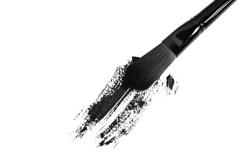 Poster - Close-up of a professional paintbrush dipped in glossy black acrylic paint on a clean background, showcasing the tools of a passionate artist.