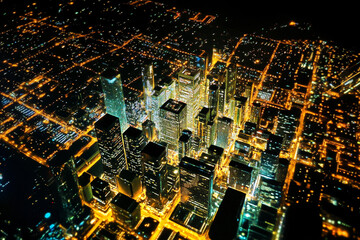 Poster - City skyline illuminated at night from above