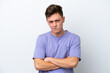 © luismolinero - Young handsome Brazilian man isolated on white background with unhappy expression