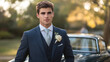© thongsook - A stylish portrait of a groom standing confidently in his wedding suit with a detailed focus on his boutonniere and tie