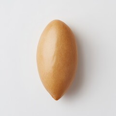 Poster - Almond with smooth tan skin resting on a white surface in a minimalistic setting